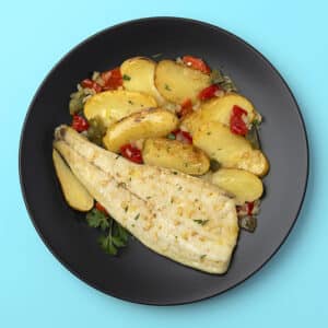 Lubina al horno con patatas panaderas
